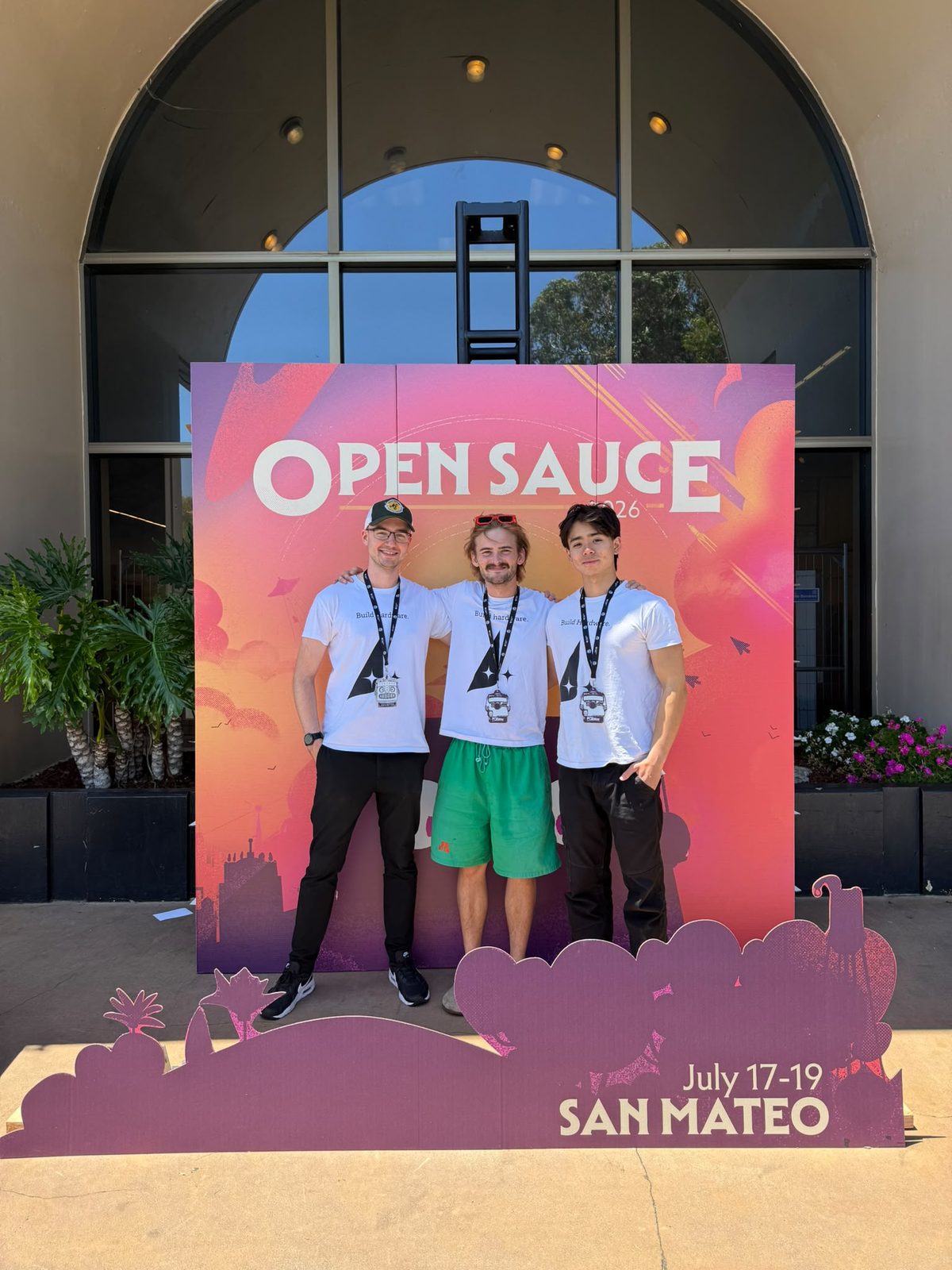 Three of us at the Open Sauce 2026 backdrop