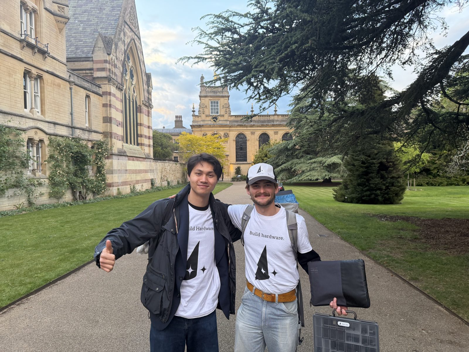 Two of us in Build Hardware shirts in a college garden