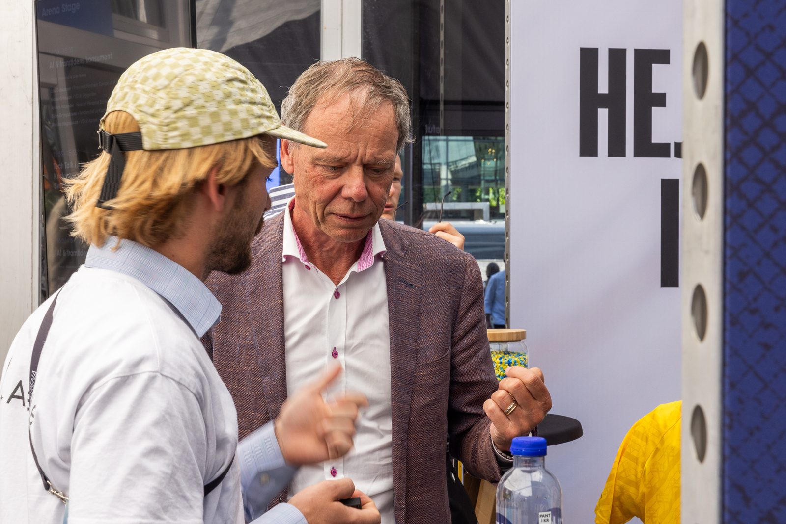 A conversation at the booth